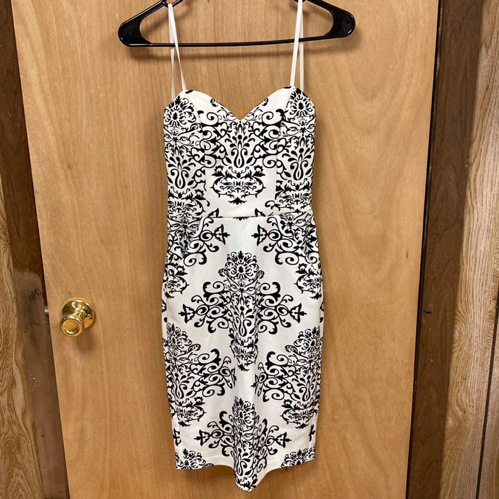 B. Darlin white and black strapless dress.